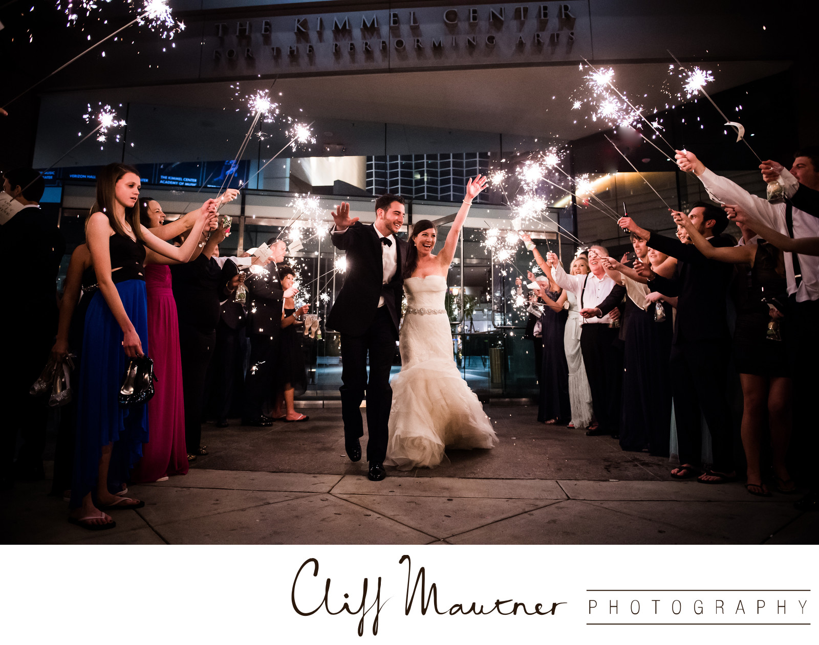 night photo couple leaving reception